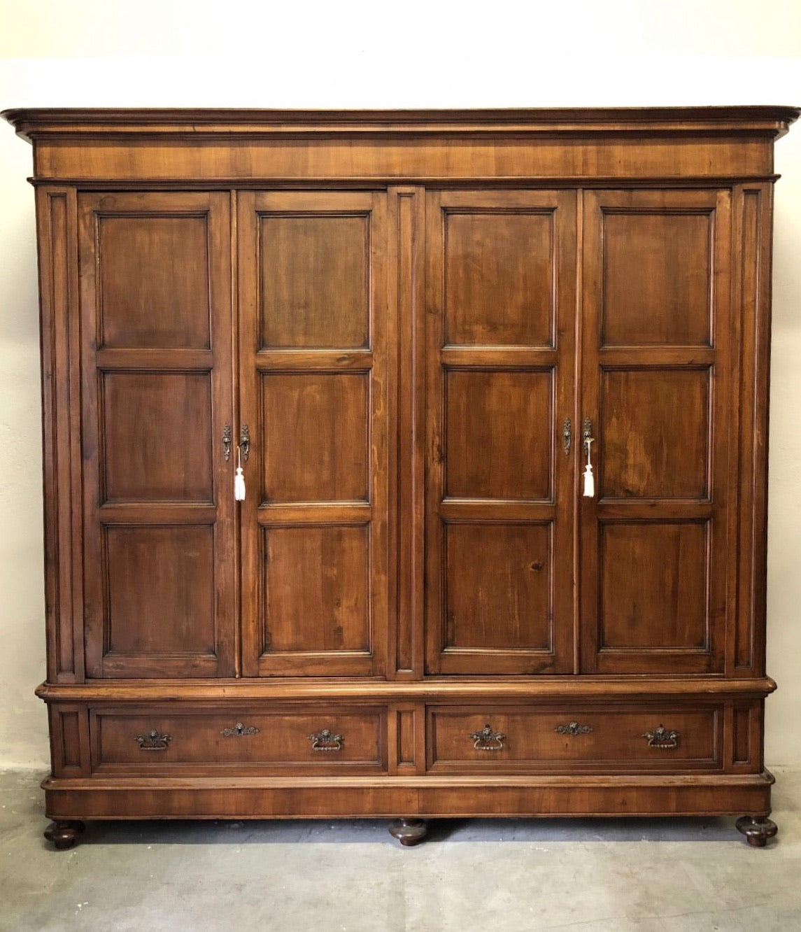 Lombard Charles X wardrobe, four doors, walnut. 19th century