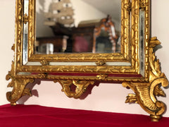 Specchiera in legno intagliato e dorato. Venezia XIX secolo