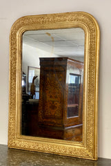 Specchiera in legno dorato intagliato . XIX secolo
