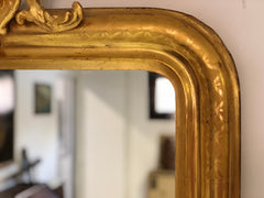 Specchiera in foglia oro zecchino con cimasa traforata