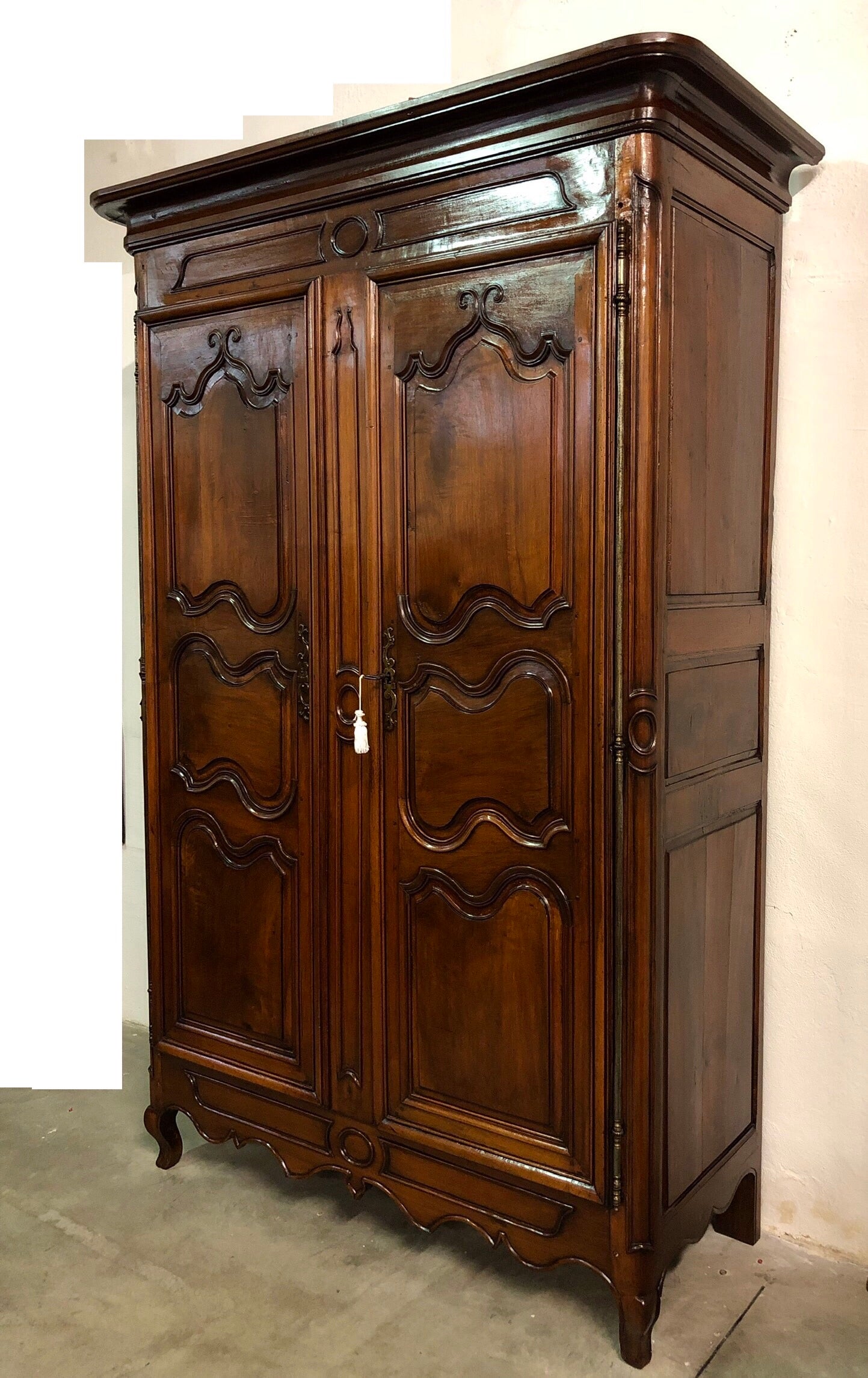Louis XV carved walnut wardrobe.