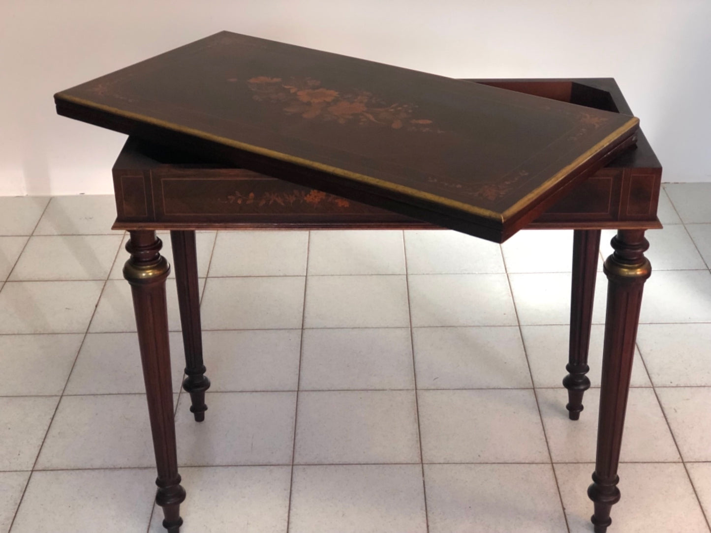 Inlaid veneered table. 19th century