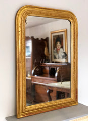 Specchiera lombarda in foglia oro zecchino . Metà XIX secolo . Restaurata