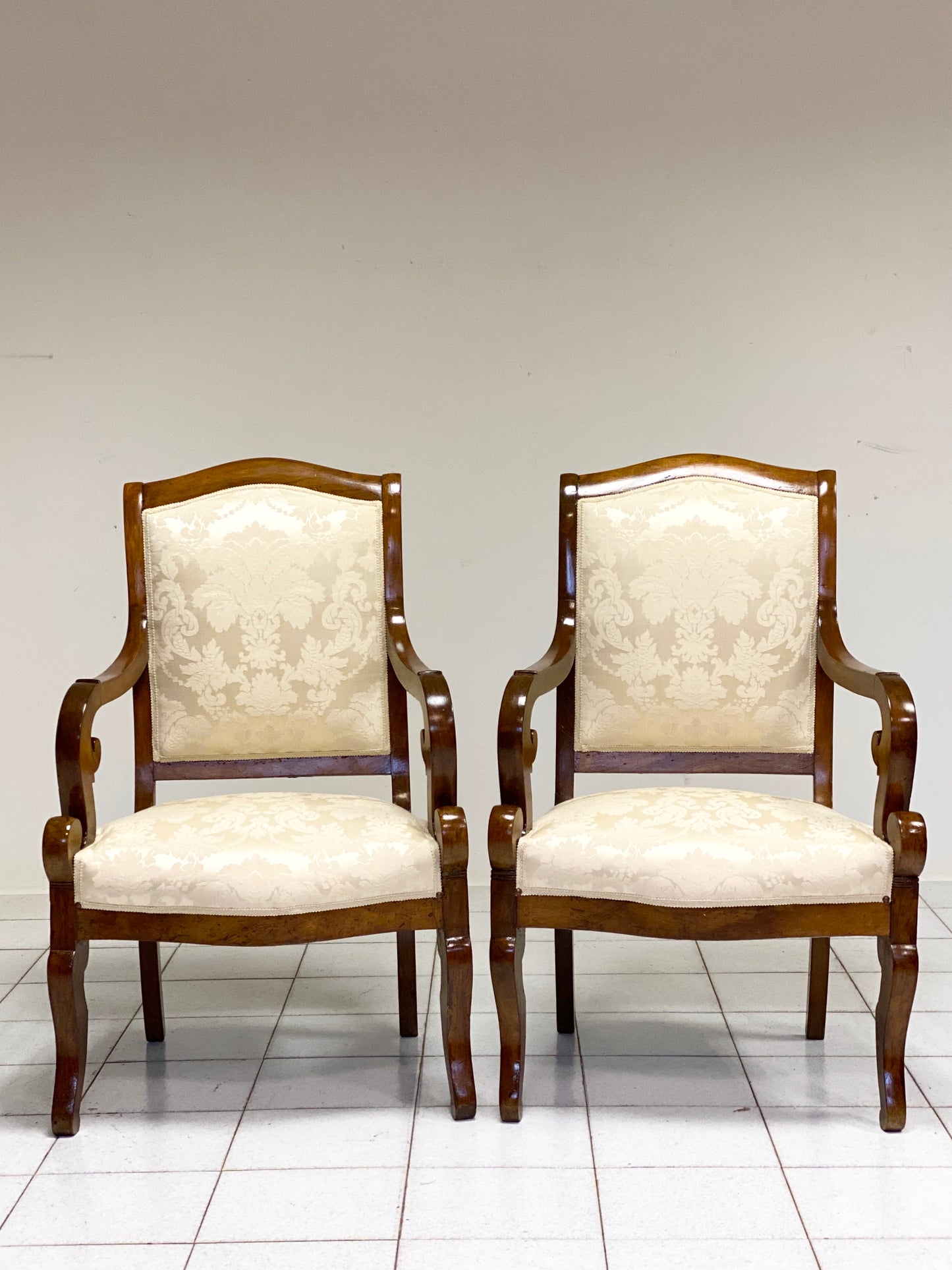 Pair of Empire Walnut Armchairs. Early 19th Century