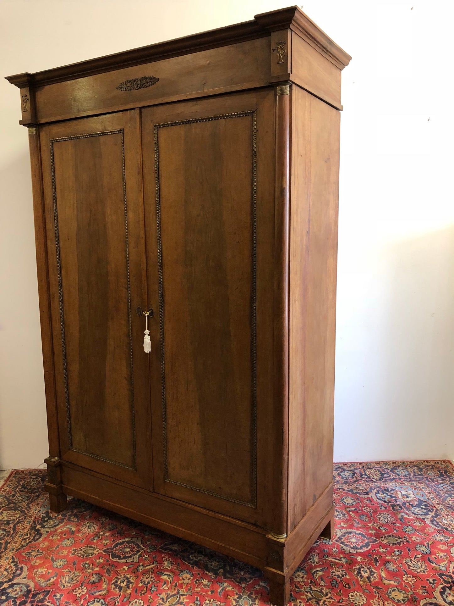Empire period walnut wardrobe with half columns