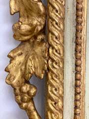 Specchiera lignea intagliata laccata dorata . Firenze fine XVIII secolo