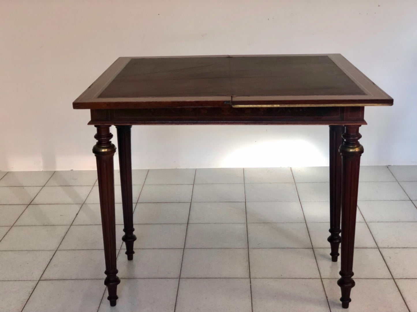 Inlaid veneered table. 19th century