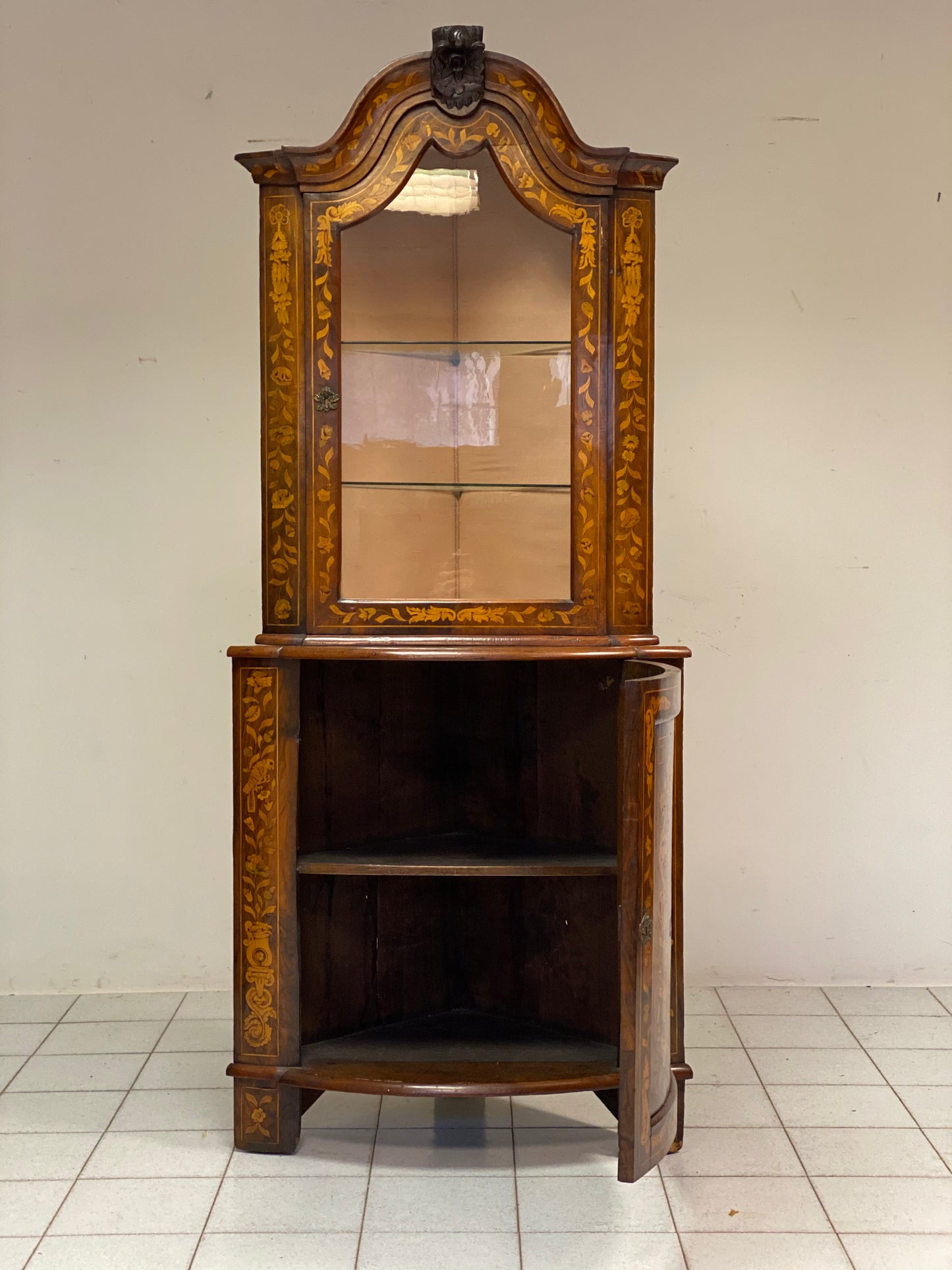 Dutch inlaid corner cupboard. Early 19th century