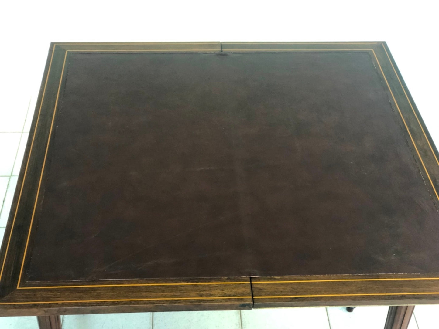 Inlaid veneered table. 19th century