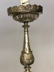 Coppia di candelieri Luigi XV in argento . Inizio XVIII secolo