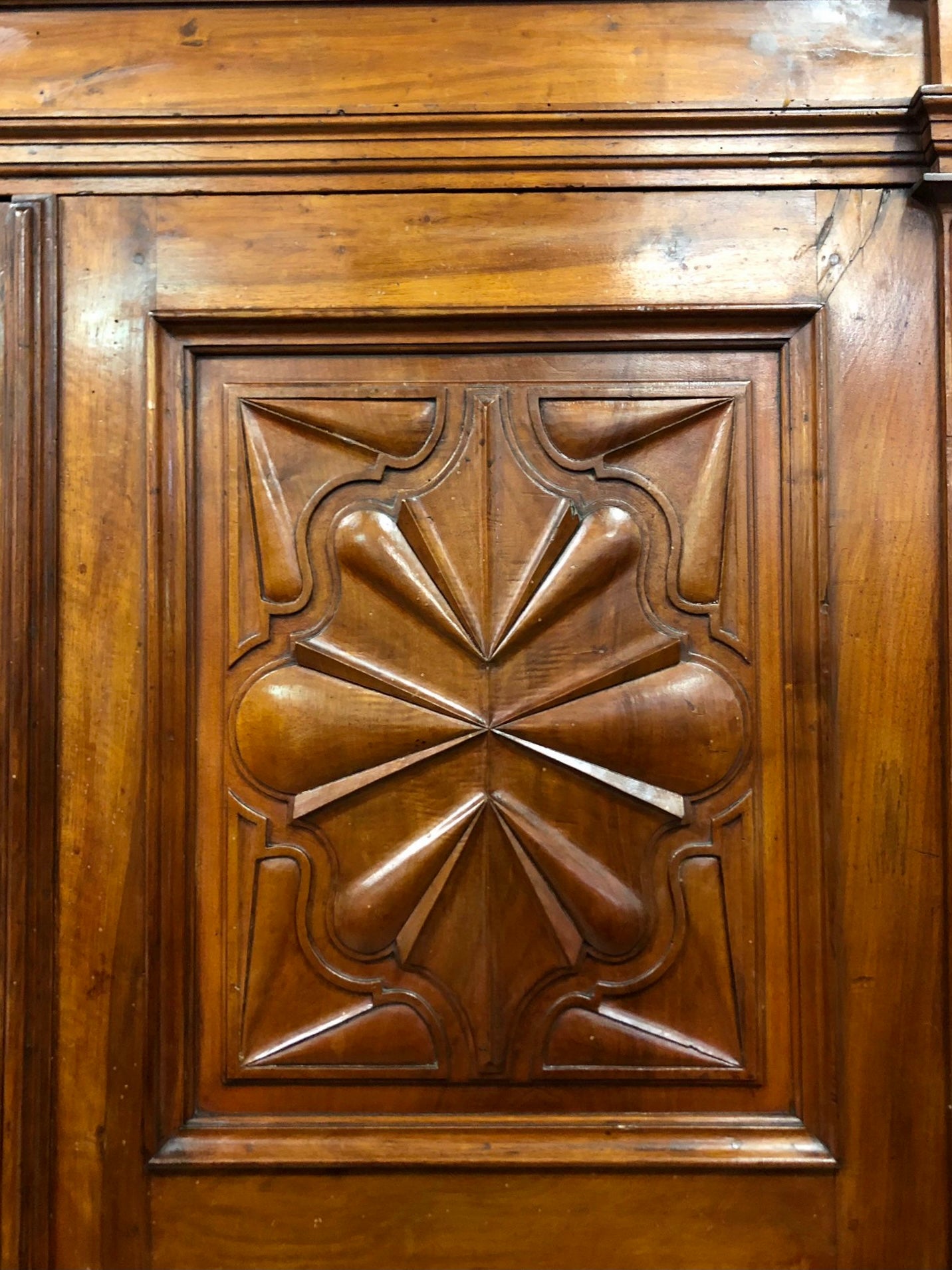 Walnut wardrobe carved with four-leaf clover Genoa late 17th century
