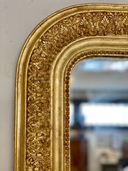 Specchiera in legno dorato intagliato . XIX secolo
