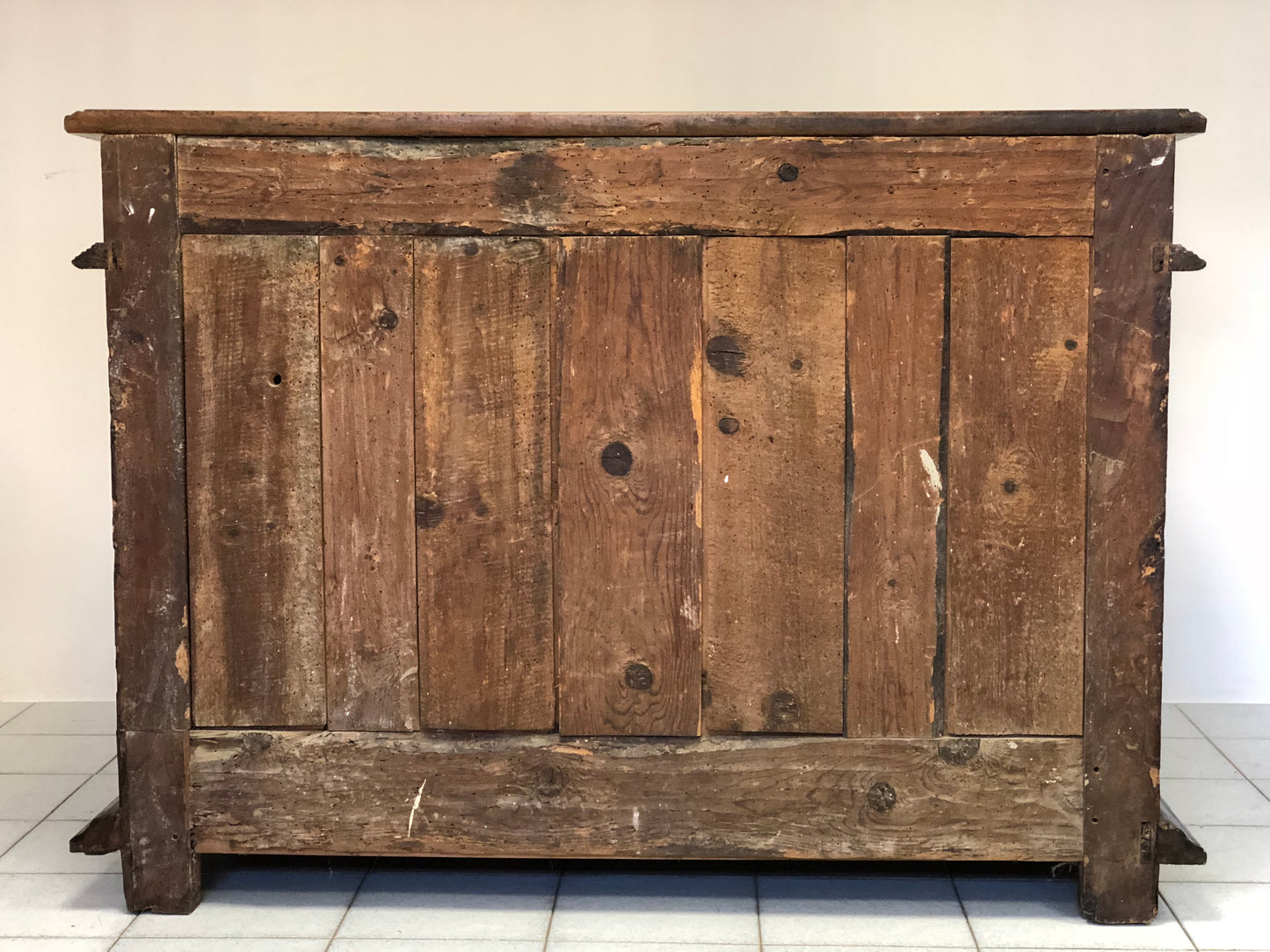 Walnut sideboard with paneled front and sides. 17th century