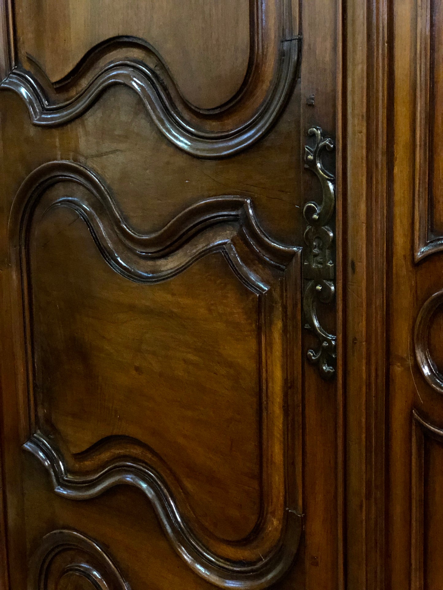 Louis XV carved walnut wardrobe.