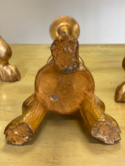 Gruppo di quattro candelieri in foglia oro . Lombardia epoca impero