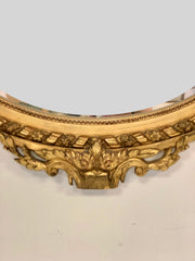 Specchiera lombarda ovale con stemma . XIX secolo
