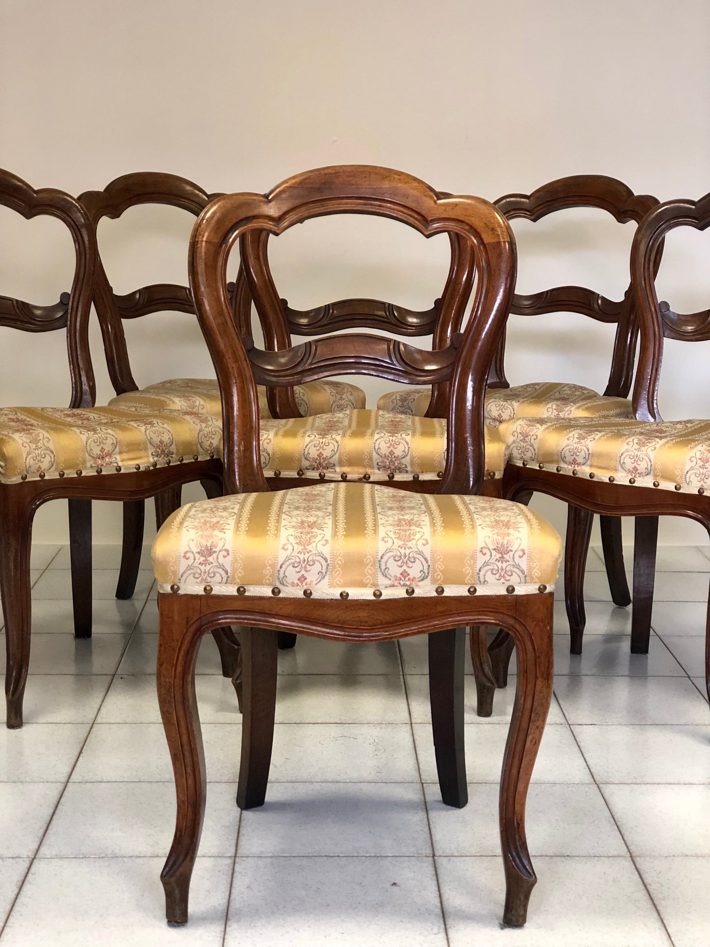 Six Lombard walnut chairs. Second half of the 19th century