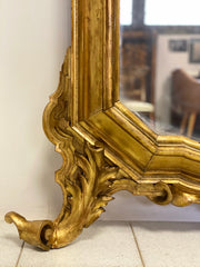 Specchiera in legno intagliato e dorato. Lombardia primo 800
