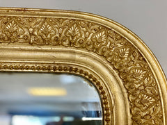 Specchiera in legno dorato intagliato . XIX secolo