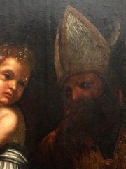Olio su tavola Madonna con il bimbo e santo vescovo Lombardia XVI secolo