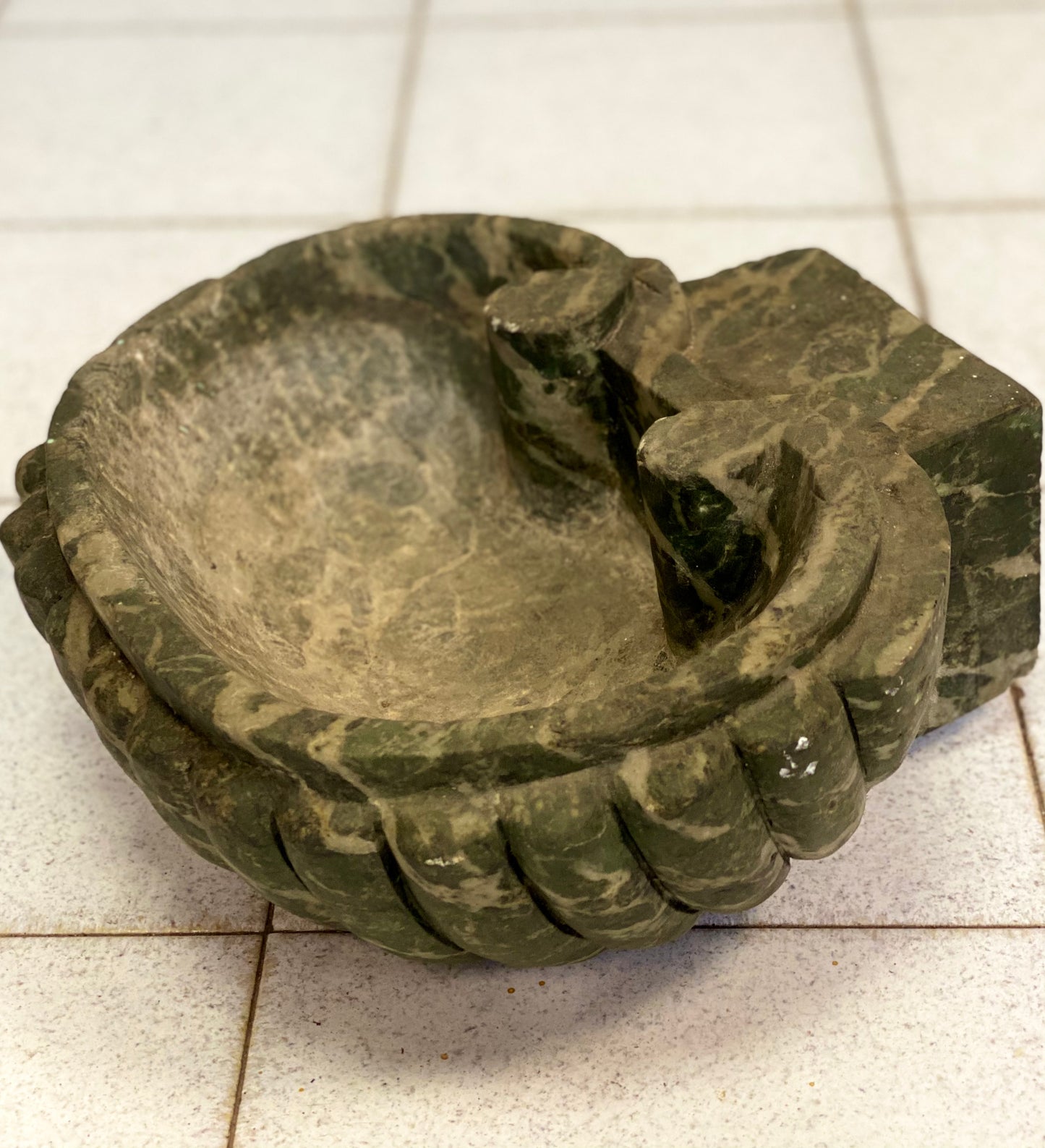Marble holy water stoup in the shape of a shell. 19th century