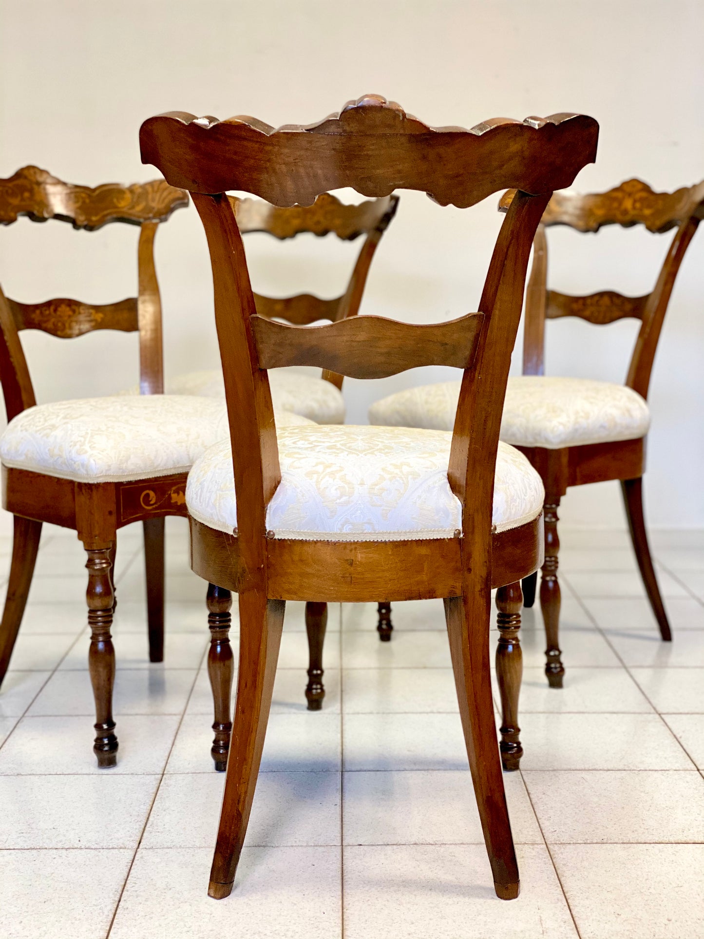 Group of four Charles X inlaid chairs. Early 19th century