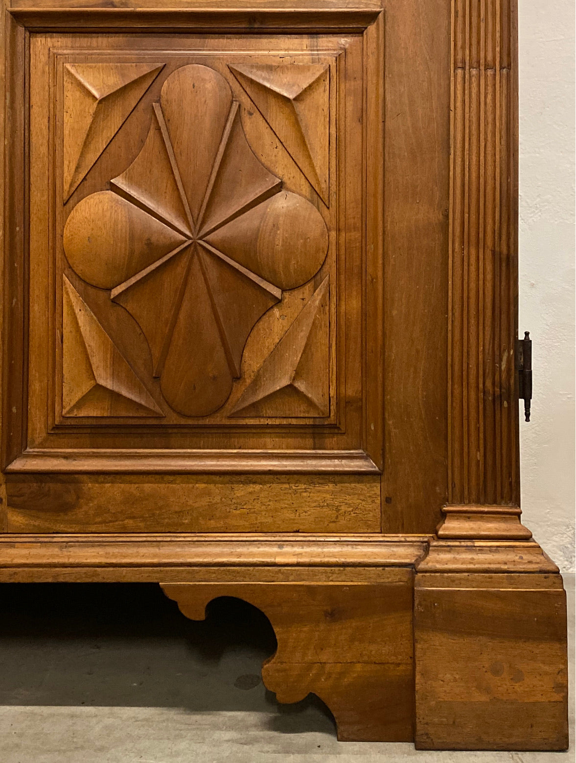 Walnut wardrobe carved with cloverleaf Genoa mid 18th century