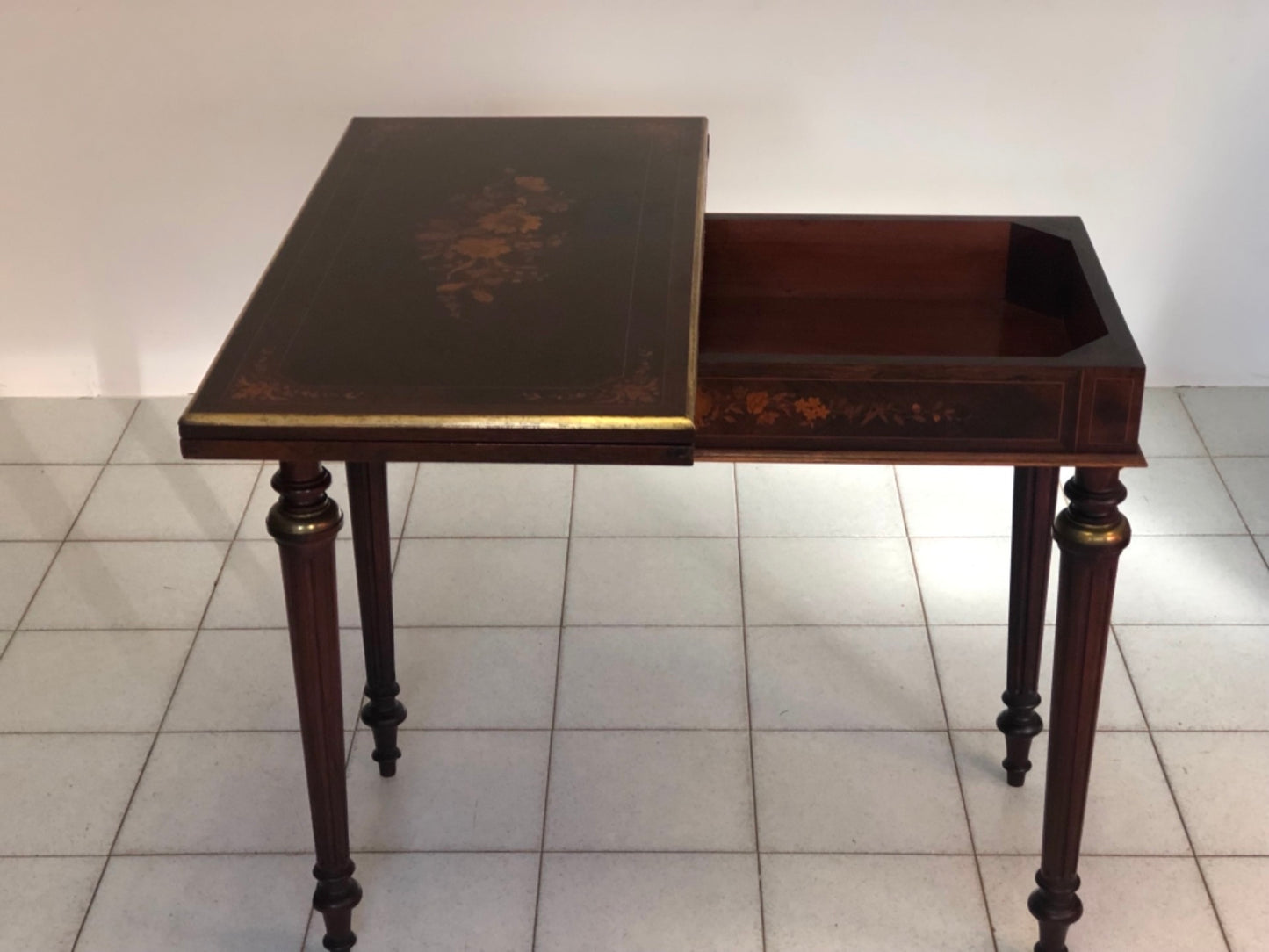 Inlaid veneered table. 19th century