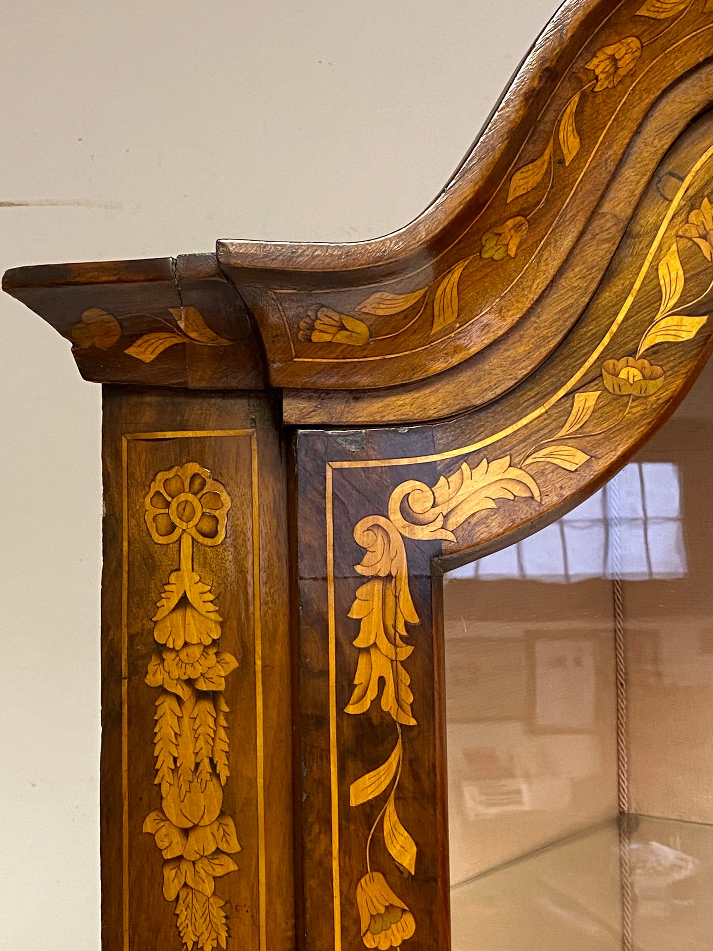 Dutch inlaid corner cupboard. Early 19th century