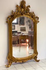Specchiera in legno intagliato e dorato. Lombardia primo 800