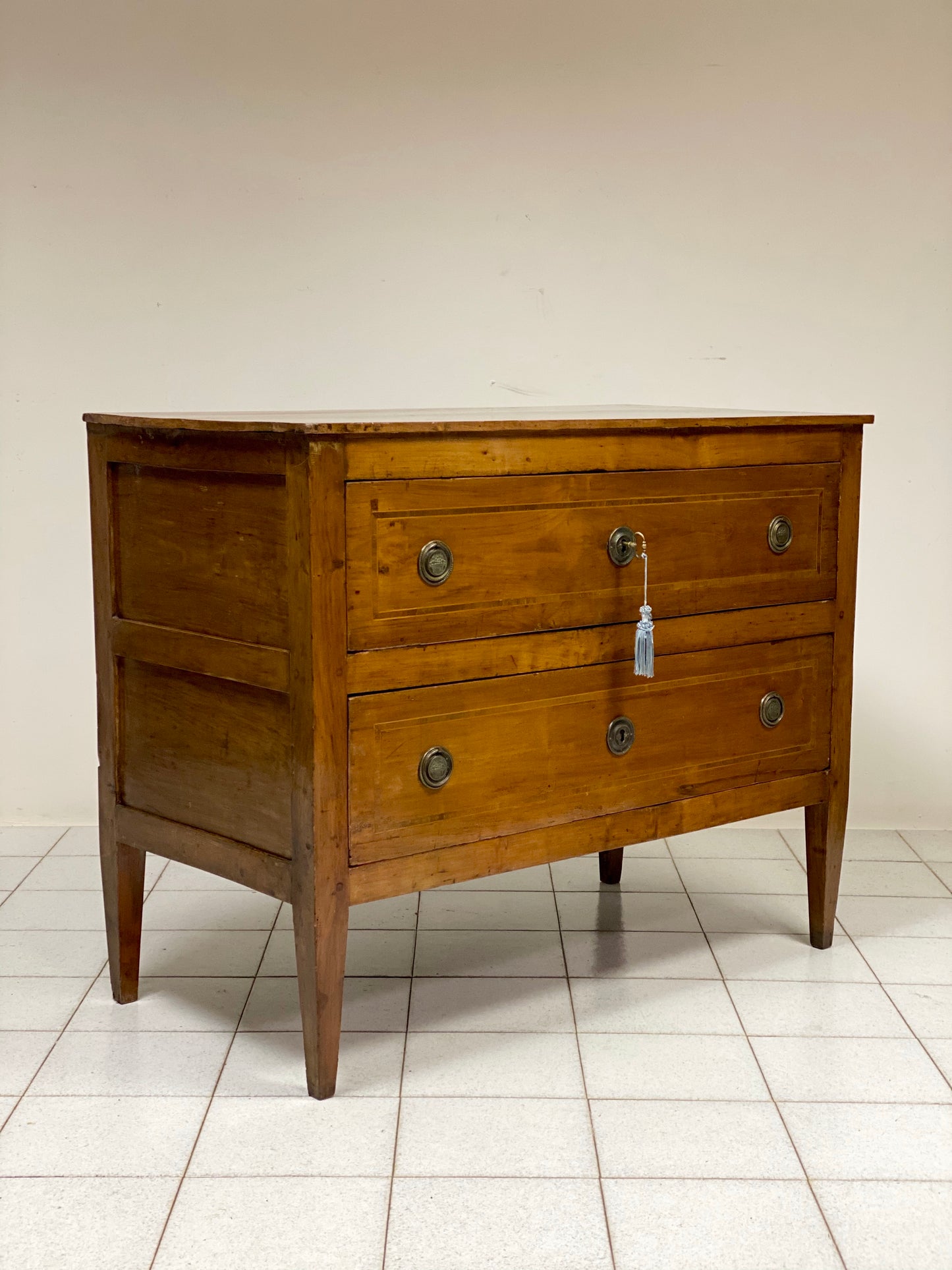 Inlaid cherry directorate chest of drawers. Lombardy, early 19th century