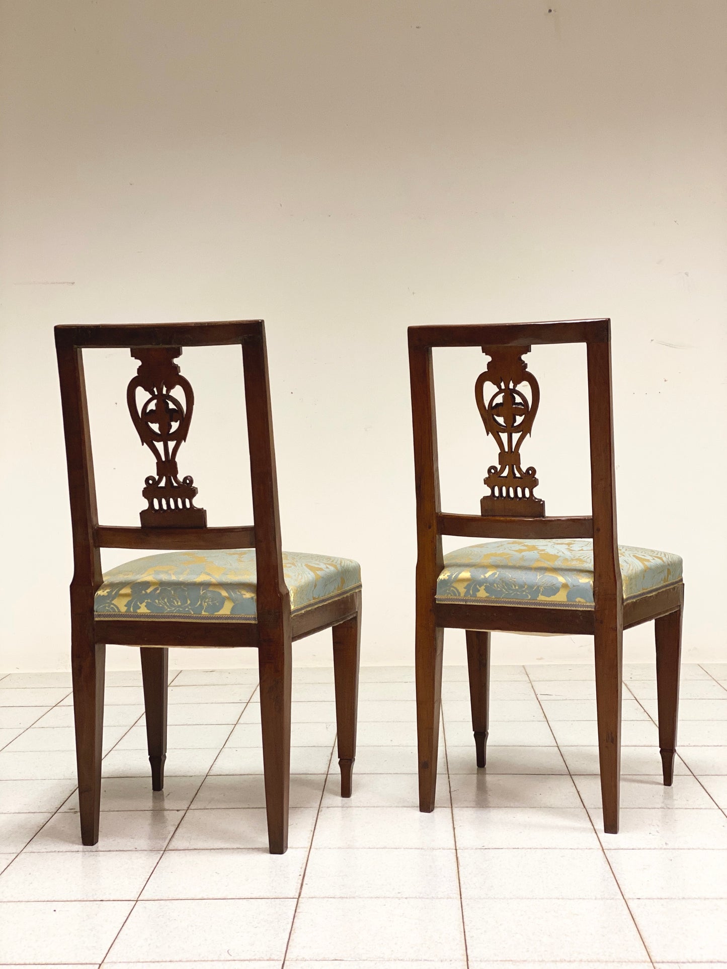 Pair of walnut Directory chairs. Early 19th century