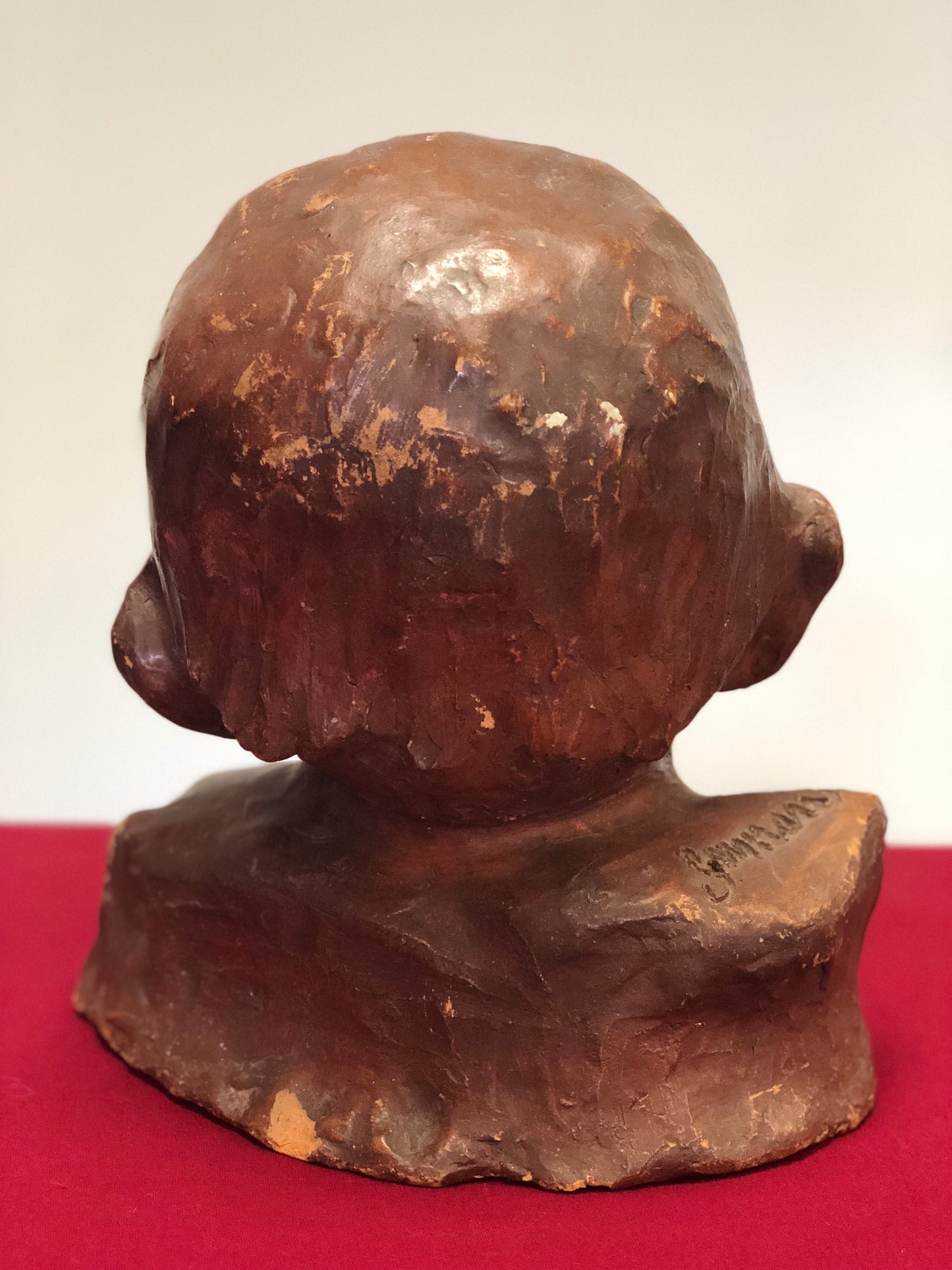 Testina di fanciullo in terracotta dell' 800