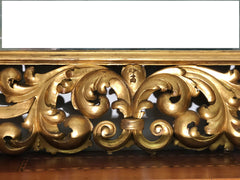 Specchiera in legno intagliato e dorato . Modena Bologna primi 700