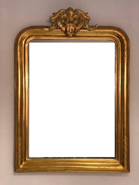 Specchiera in foglia oro zecchino con cimasa traforata