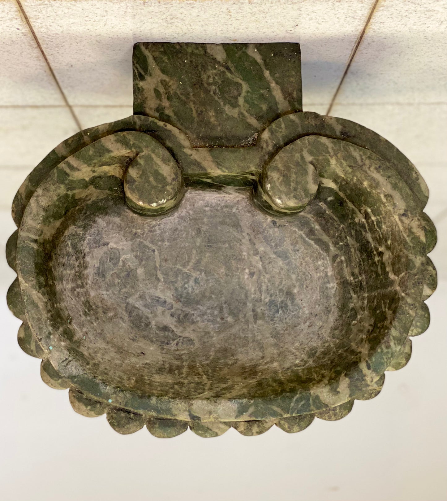Marble holy water stoup in the shape of a shell. 19th century