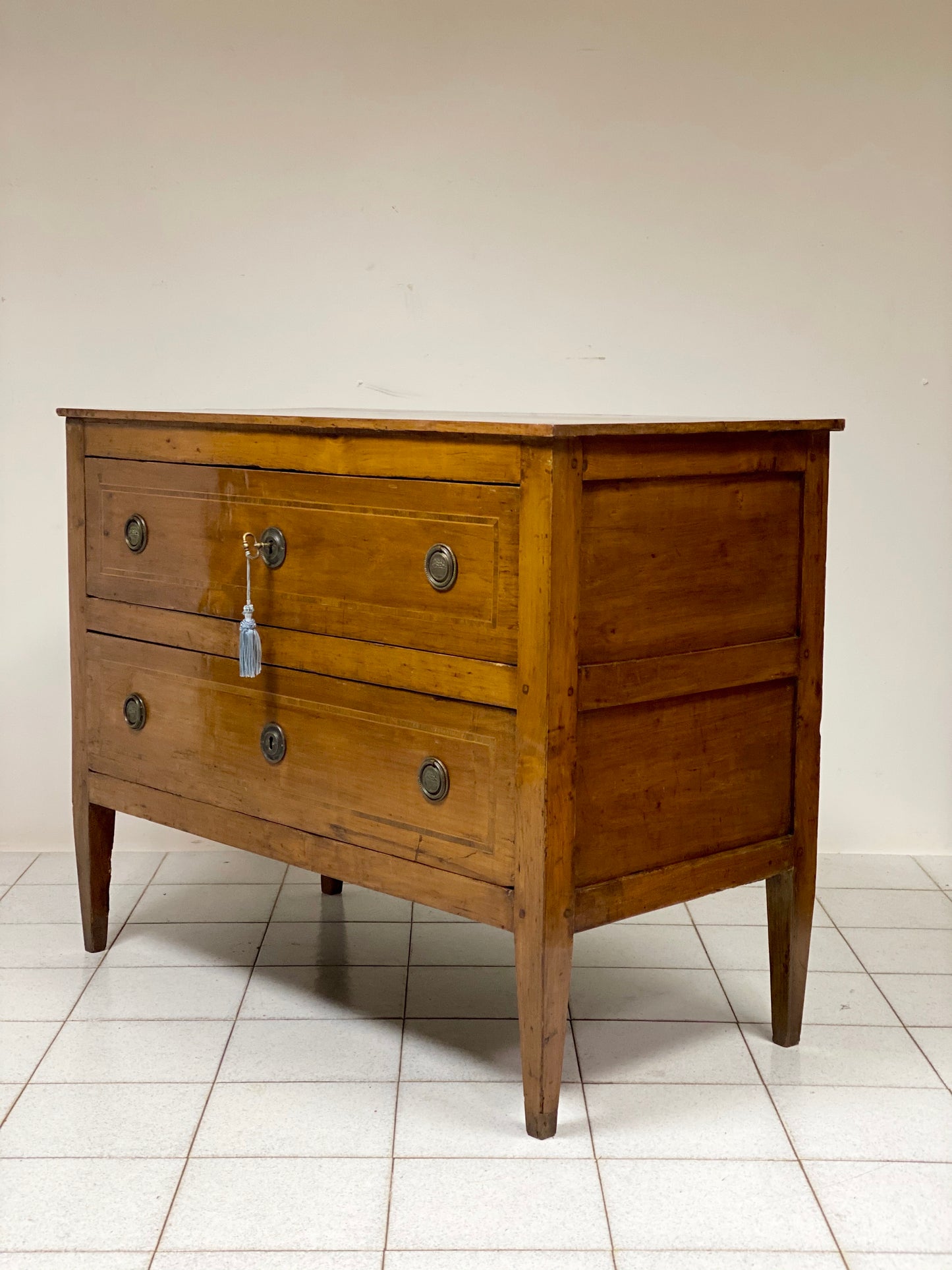 Inlaid cherry directorate chest of drawers. Lombardy, early 19th century