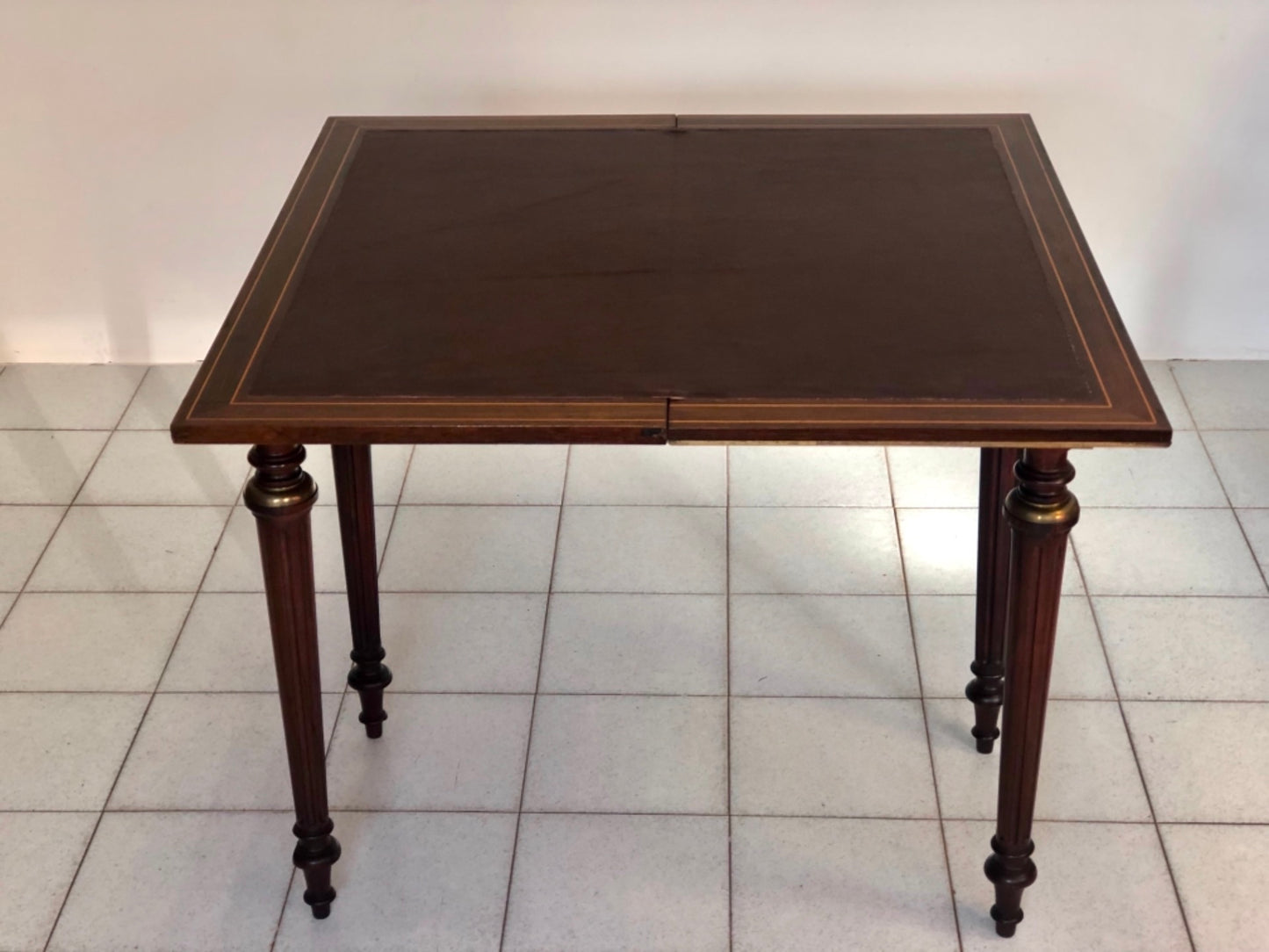 Inlaid veneered table. 19th century