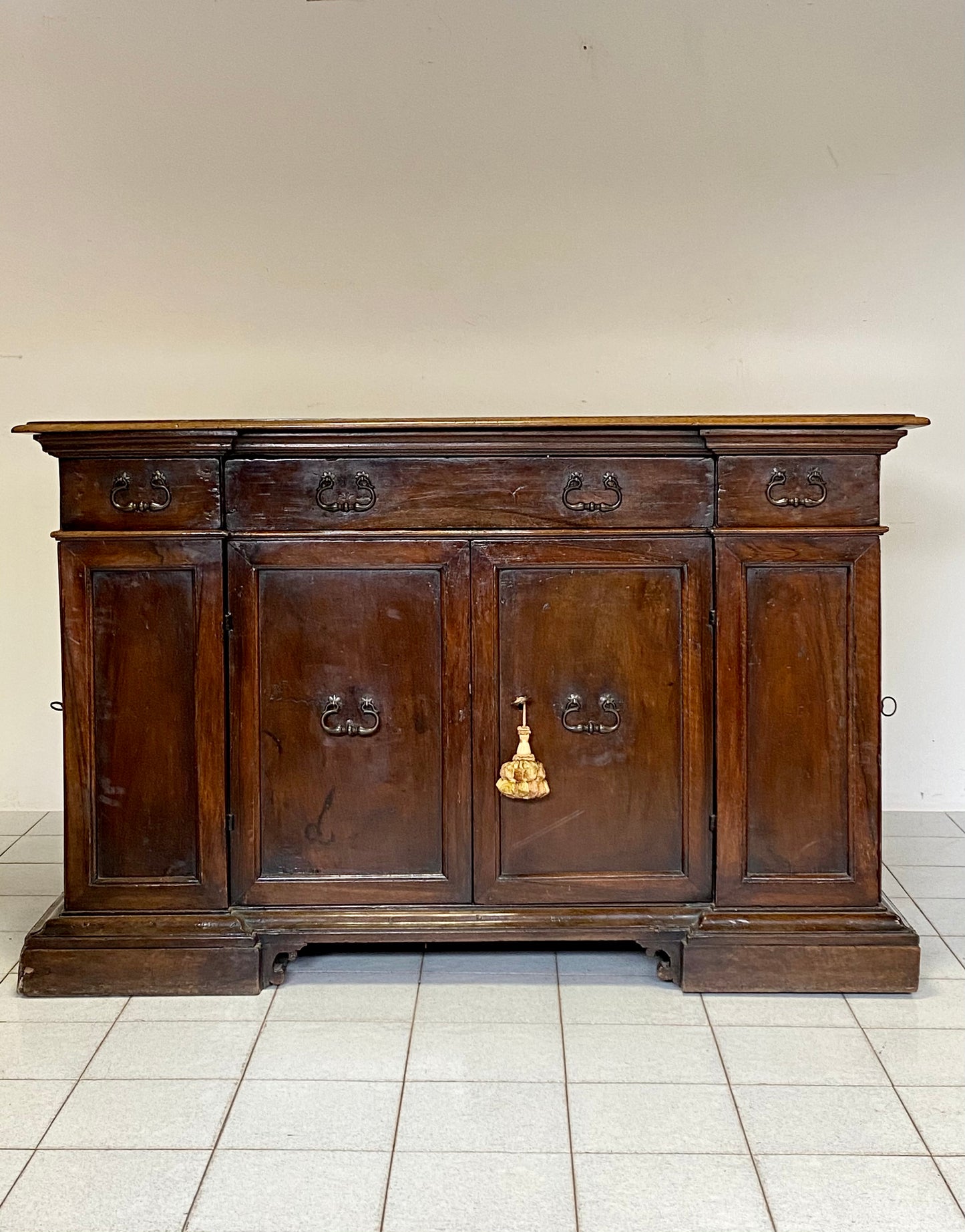Walnut sideboard with side doors. Bologna 17th century