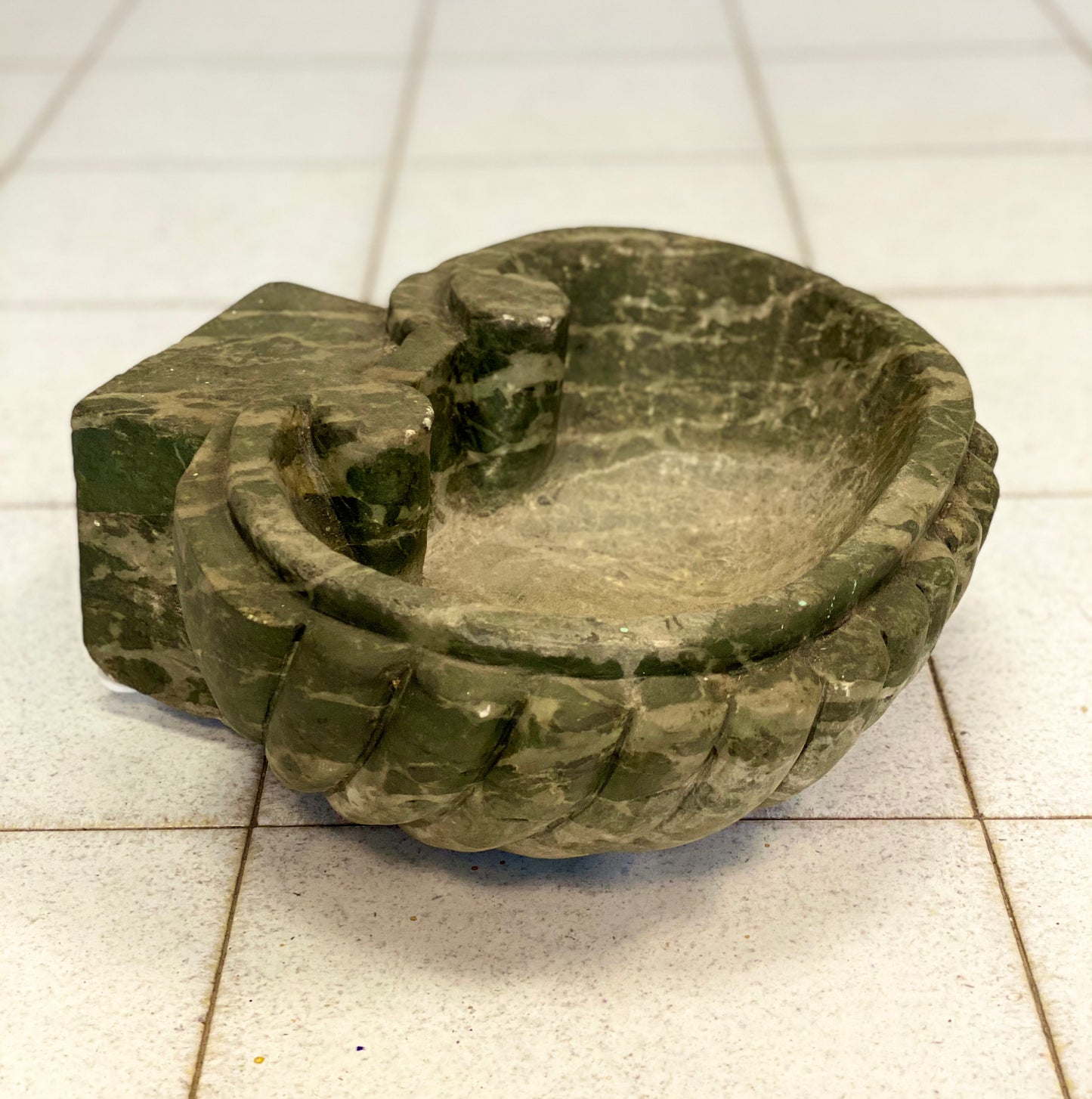 Marble holy water stoup in the shape of a shell. 19th century