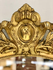 Specchiera lombarda ovale con stemma . XIX secolo
