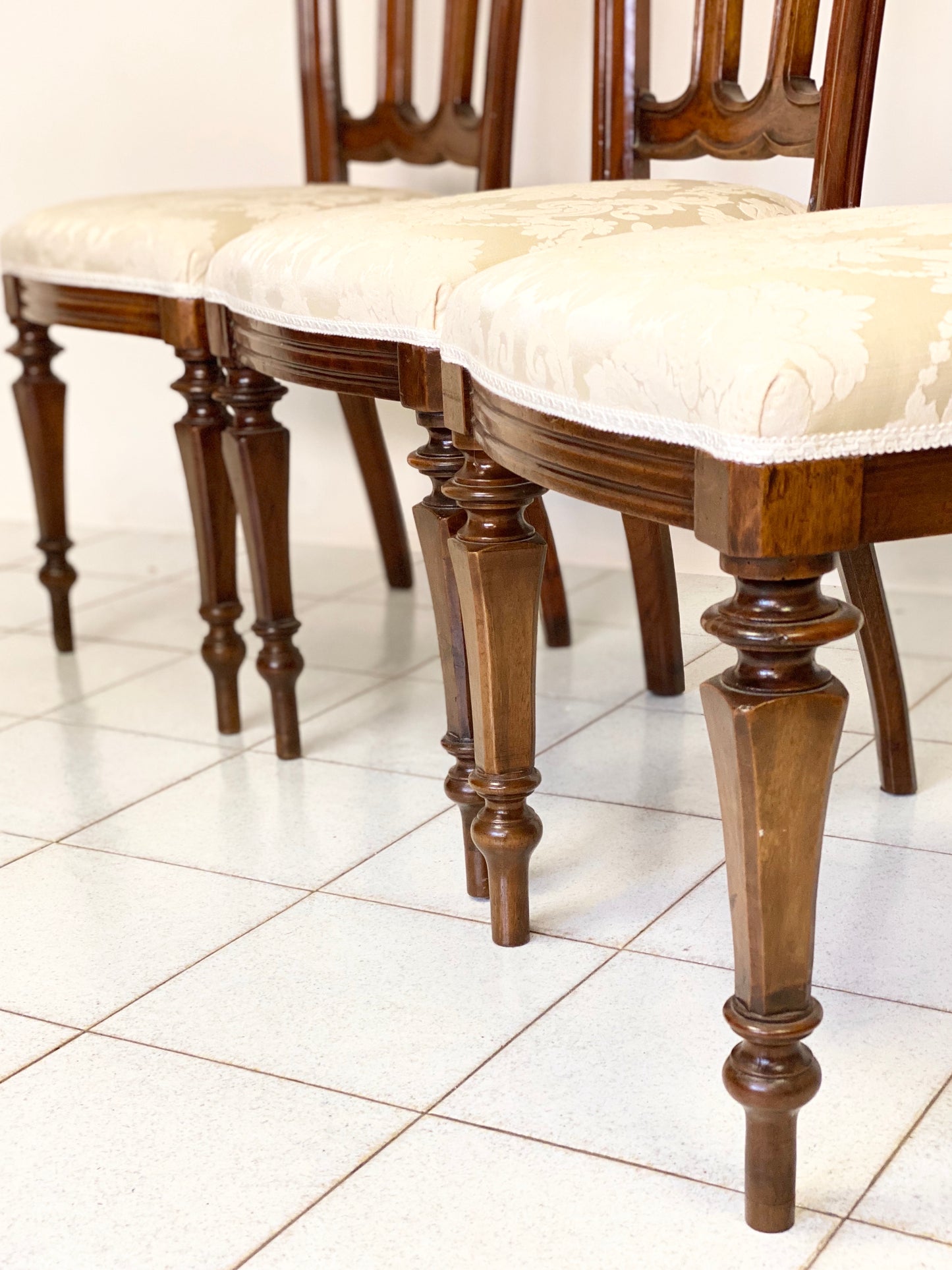 Group of four Lombard walnut chairs, mid-19th century