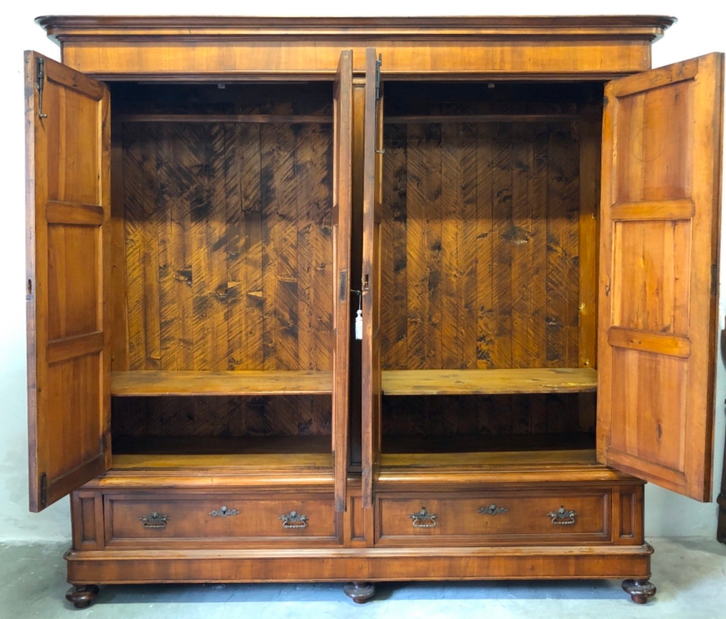 Lombard Charles X wardrobe, four doors, walnut. 19th century