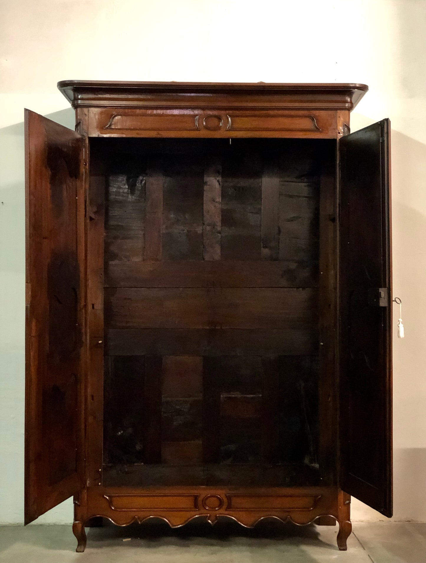 Louis XV carved walnut wardrobe.