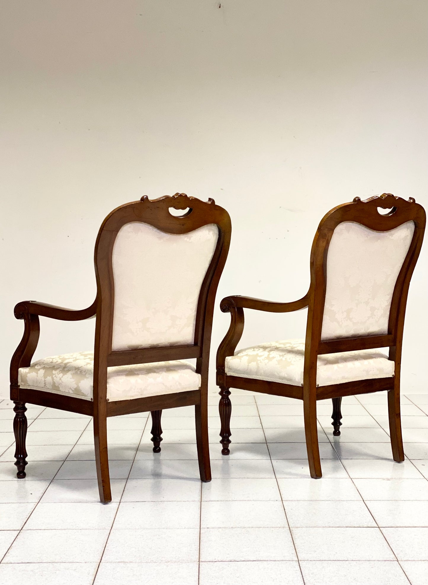 Pair of Carlo X armchairs in Lombard walnut. 19th century