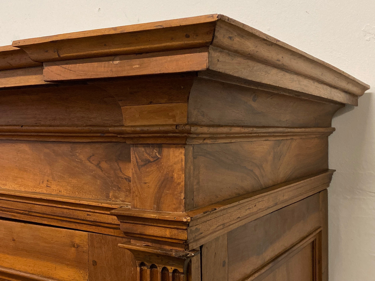 Walnut wardrobe carved with cloverleaf Genoa mid 18th century