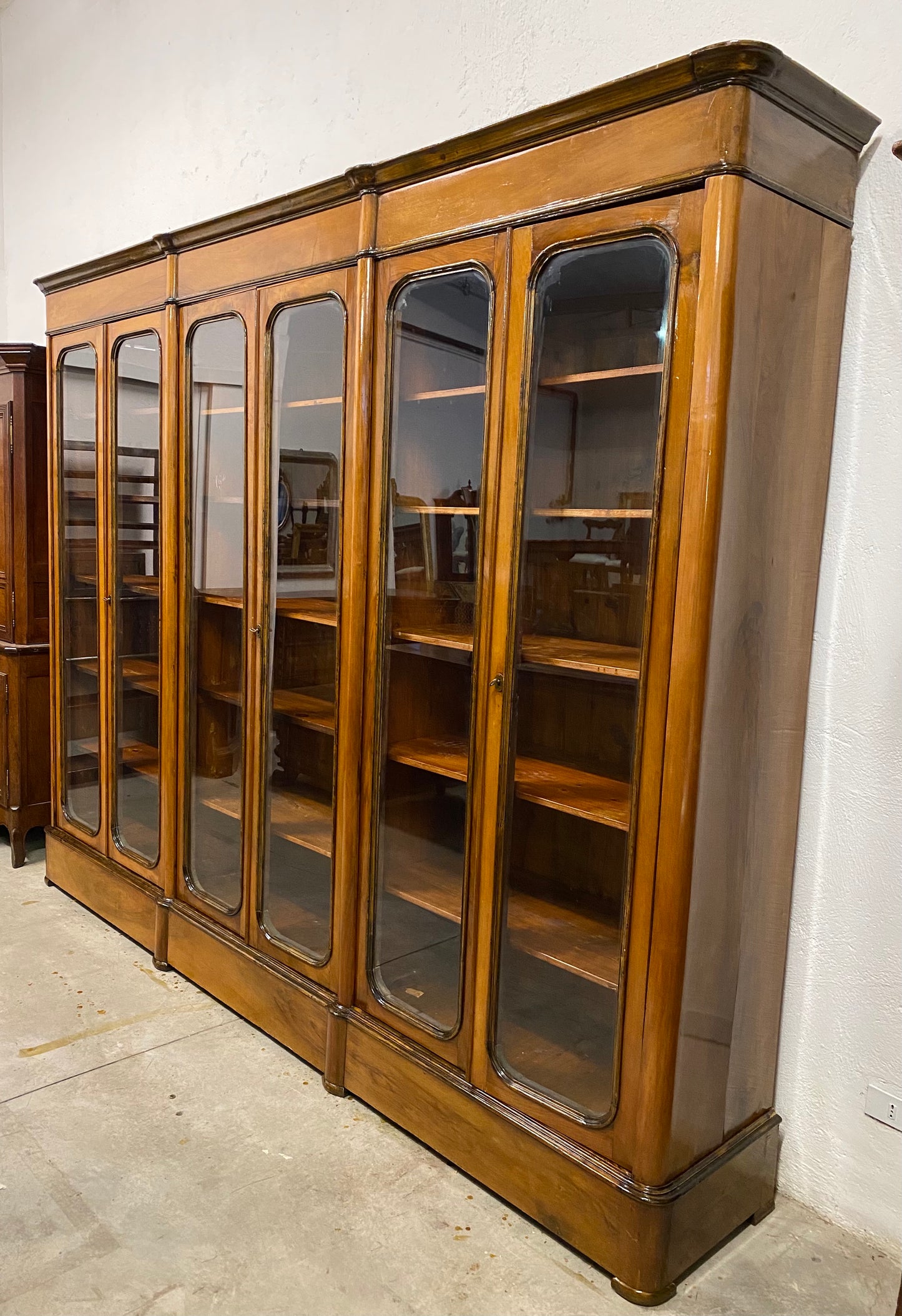 Lombard Charles X walnut bookcase. 19th century