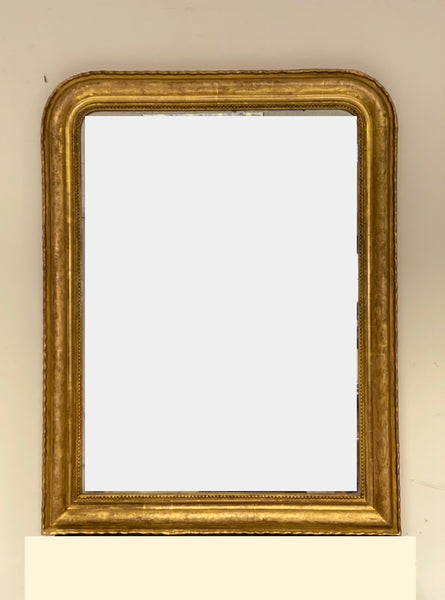 Specchiera Carlo X in foglia oro zecchino . XIX secolo . Restaurata