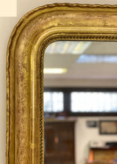 Specchiera Carlo X in foglia oro zecchino . XIX secolo . Restaurata