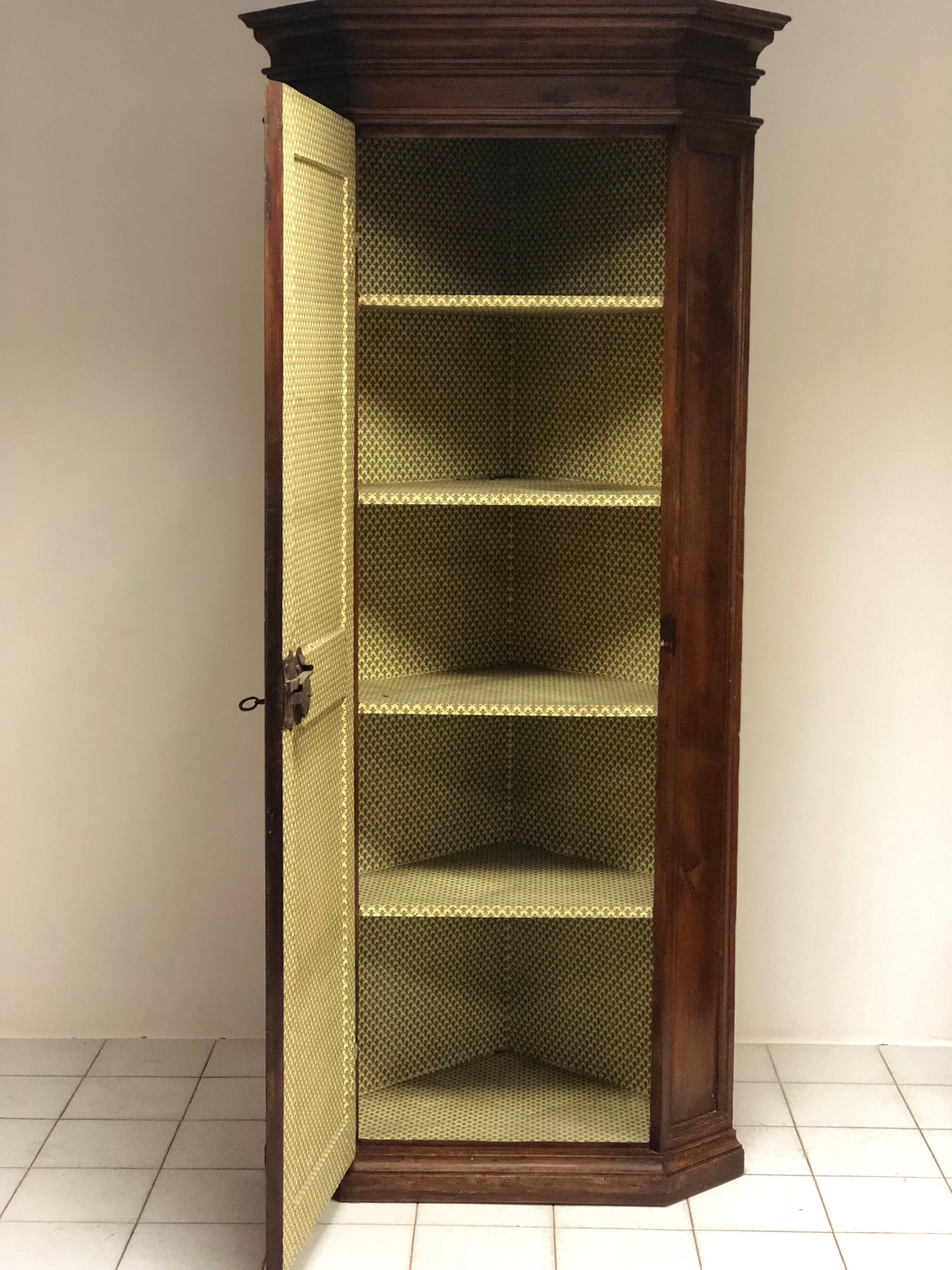 Emilian rusticated corner cupboard. 17th century